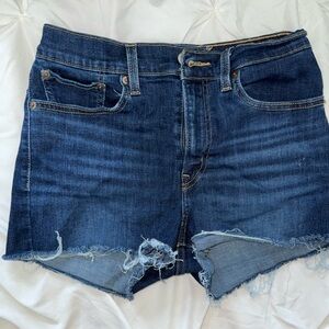 High Waist w/Stretch Levi's Blue Distressed Jean Shorts Relaxed Fit